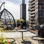 The photograph on the charming terrace of the hotel Ibis Styles Kaunas with a city view.